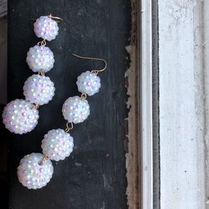 White colored reflective drop earrings!